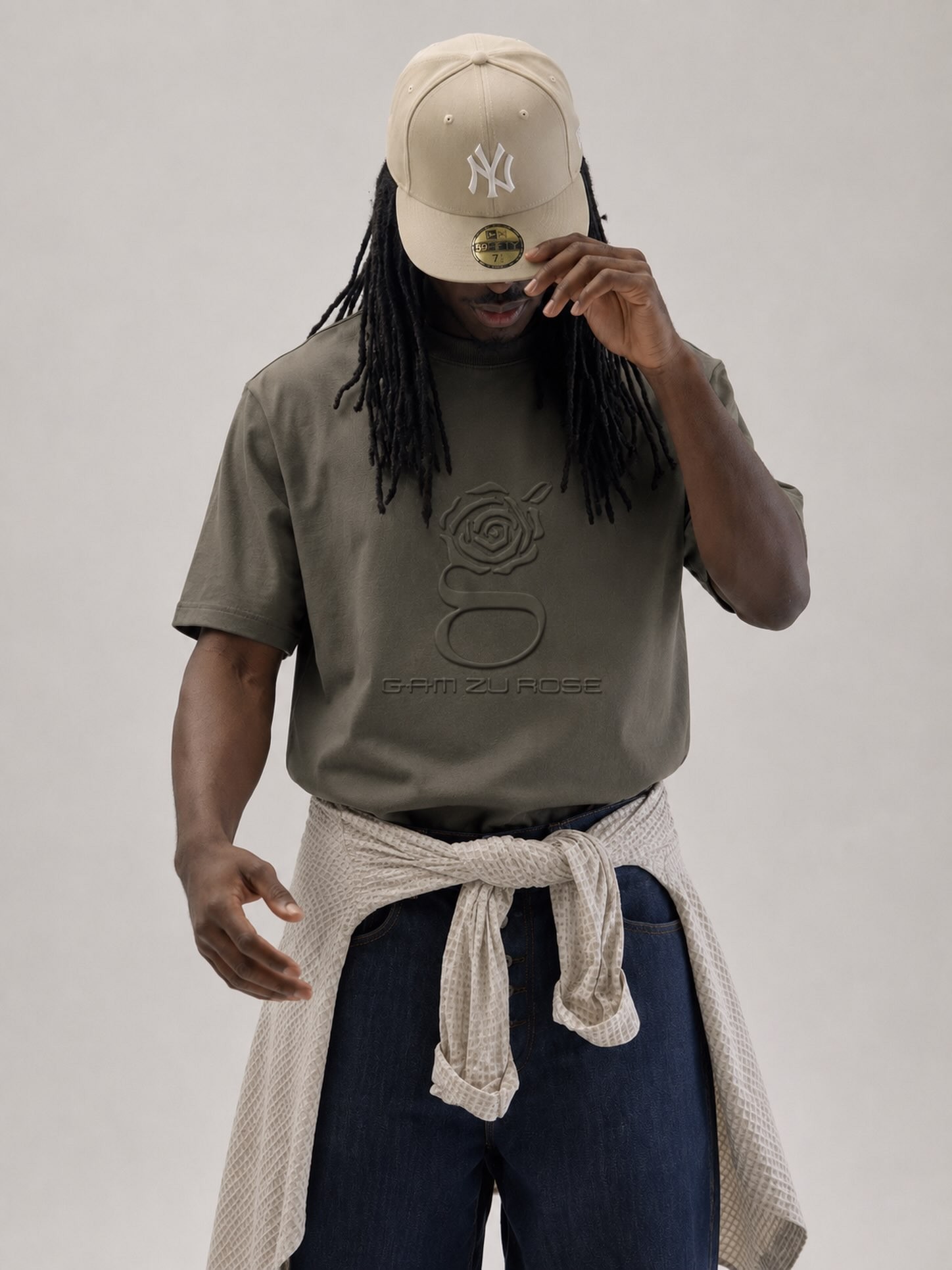 Olive tee, hoodie at the waist